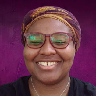 Head shot of Idris Grey